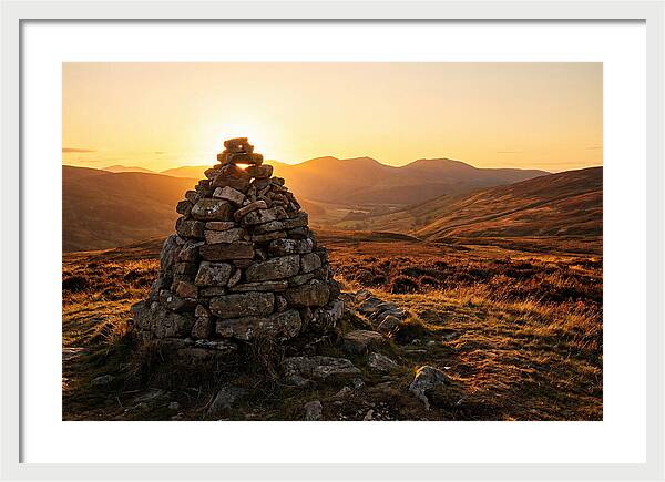 Stone Cairn At Sunset
