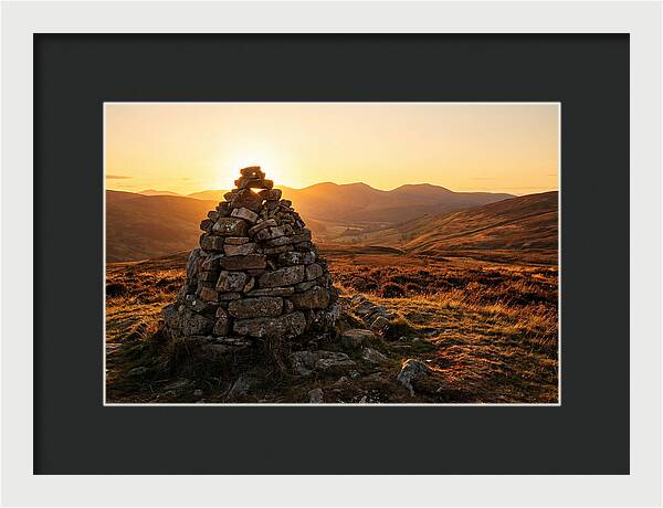 Stone Cairn At Sunset