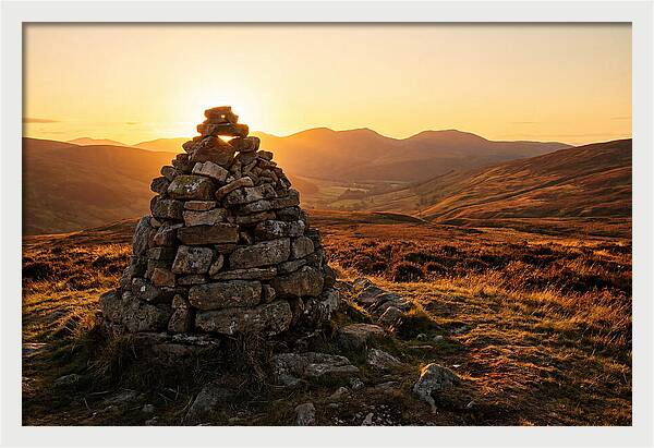 Stone Cairn At Sunset