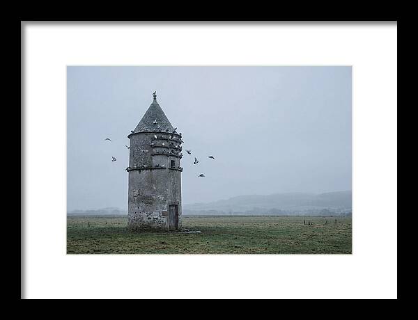 Stone Dovecote Tower In Misty Landscape
