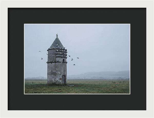 Stone Dovecote Tower In Misty Landscape