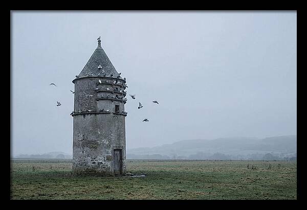 Stone Dovecote Tower In Misty Landscape