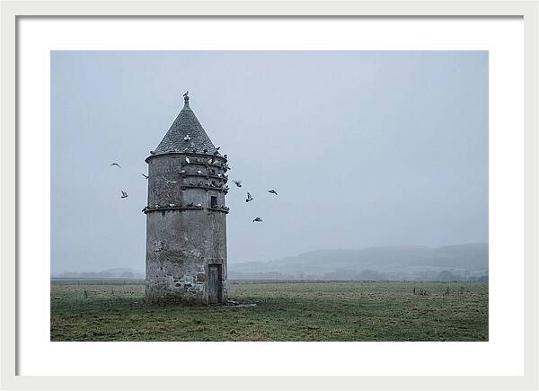 Stone Dovecote Tower In Misty Landscape