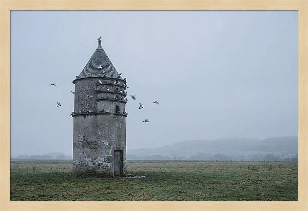Stone Dovecote Tower In Misty Landscape