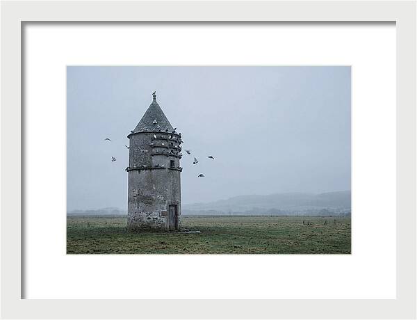 Stone Dovecote Tower In Misty Landscape