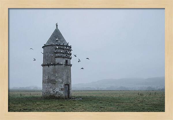 Stone Dovecote Tower In Misty Landscape