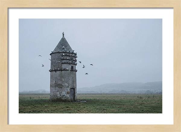 Stone Dovecote Tower In Misty Landscape