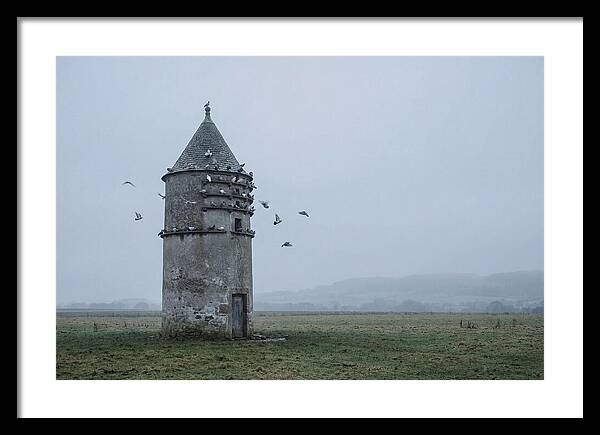 Stone Dovecote Tower In Misty Landscape