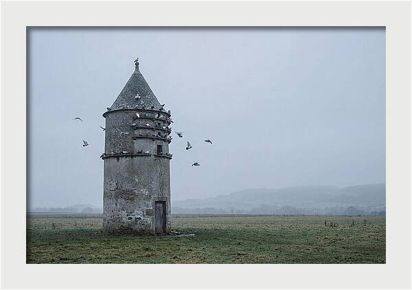 Stone Dovecote Tower In Misty Landscape