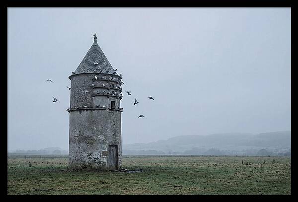 Stone Dovecote Tower In Misty Landscape