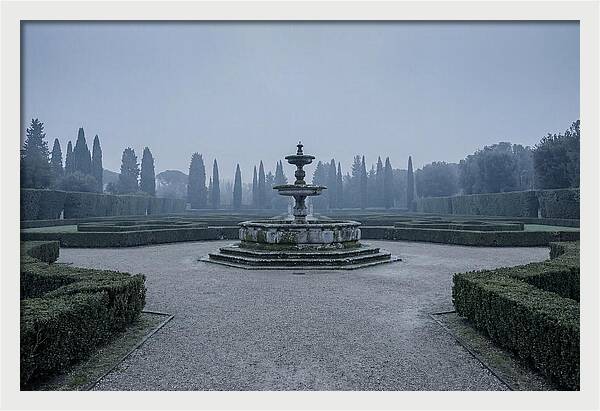 Stone Fountain In Formal Italian Garden
