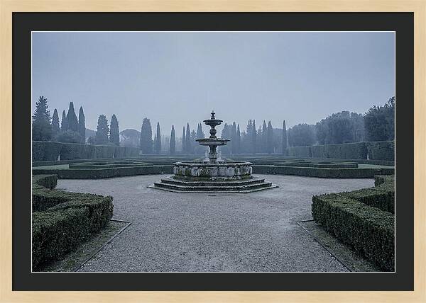 Stone Fountain In Formal Italian Garden