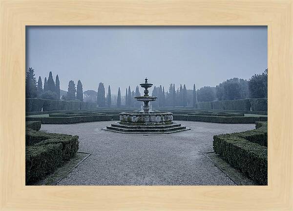 Stone Fountain In Formal Italian Garden