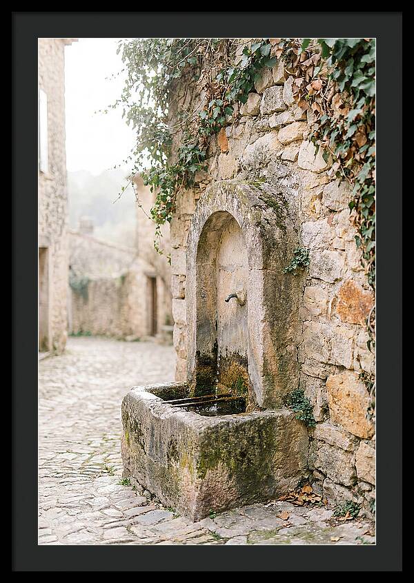 Stone Fountain In Village