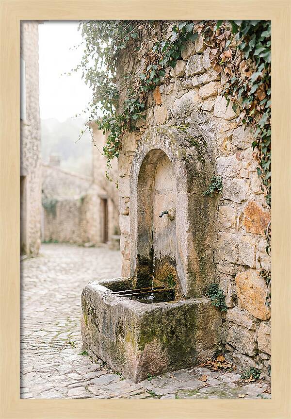 Stone Fountain In Village