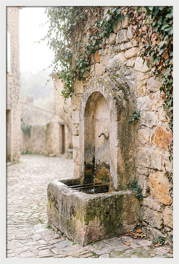 Stone Fountain In Village