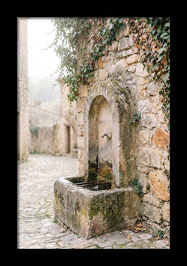 Stone Fountain In Village