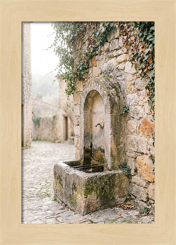 Stone Fountain In Village