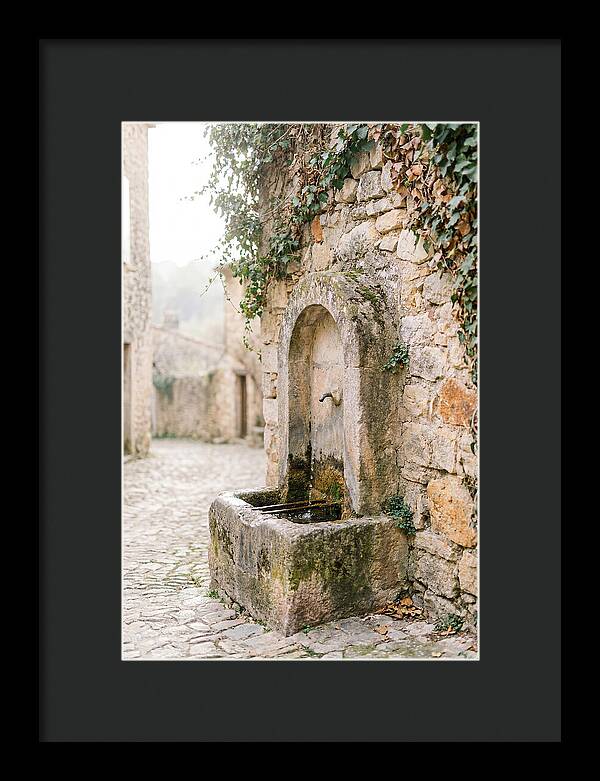 Stone Fountain In Village