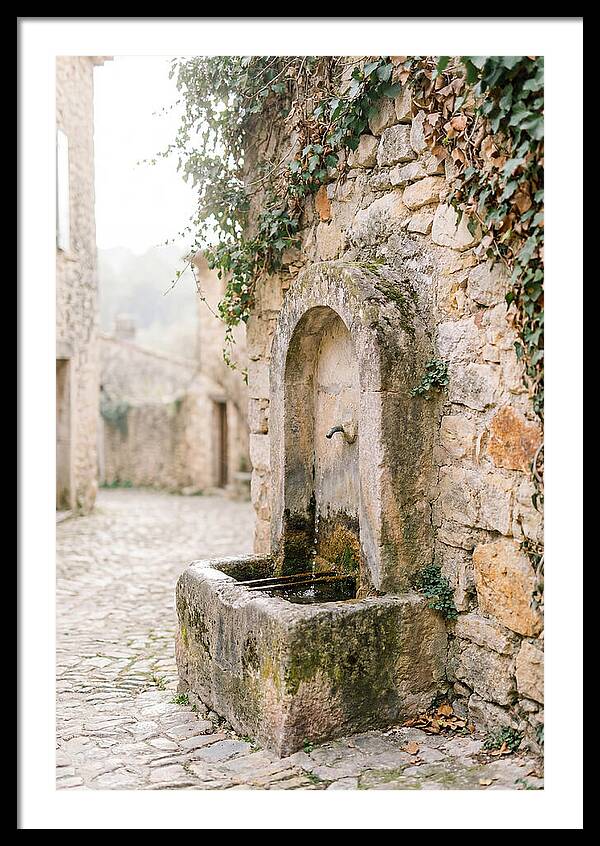 Stone Fountain In Village