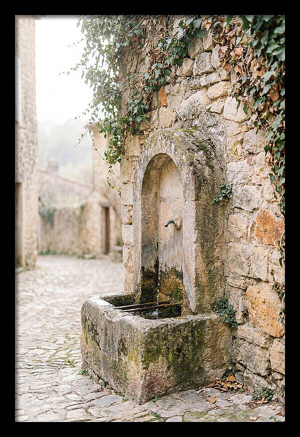 Stone Fountain In Village