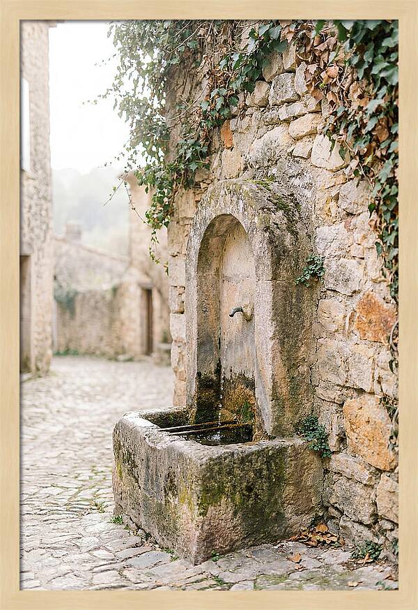 Stone Fountain In Village
