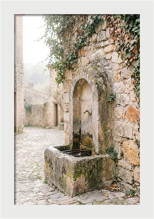 Stone Fountain In Village