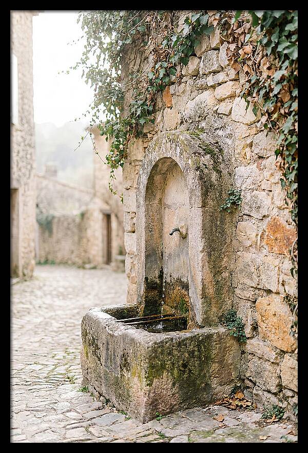 Stone Fountain In Village
