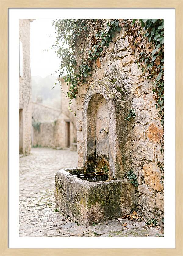 Stone Fountain In Village