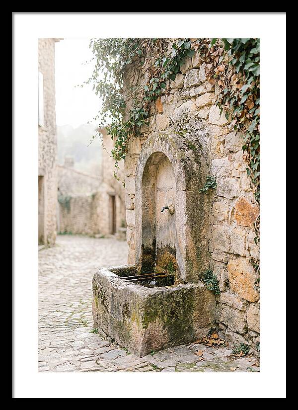 Stone Fountain In Village