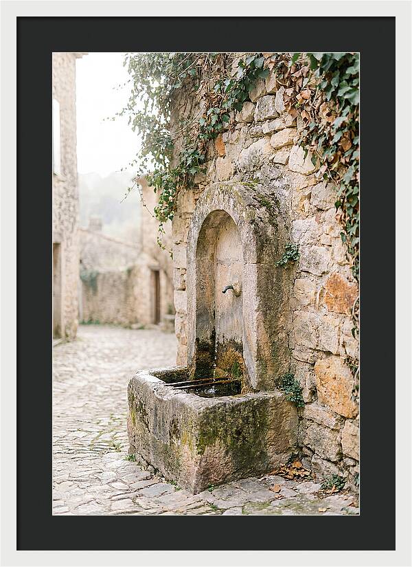 Stone Fountain In Village