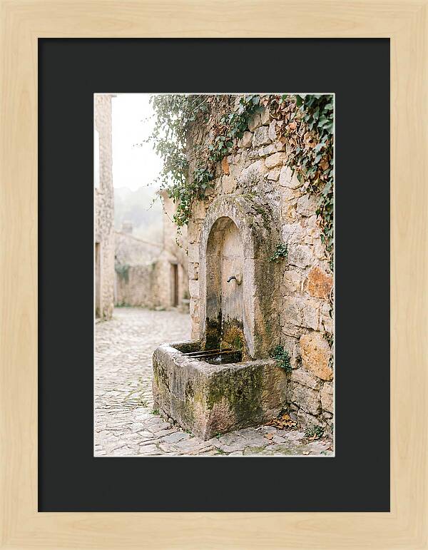 Stone Fountain In Village