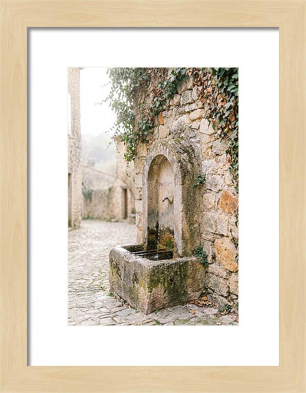 Stone Fountain In Village