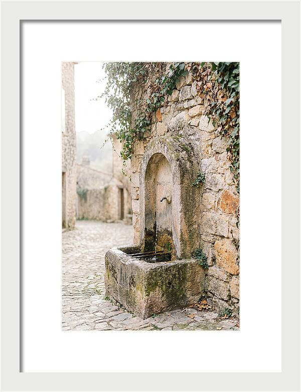 Stone Fountain In Village