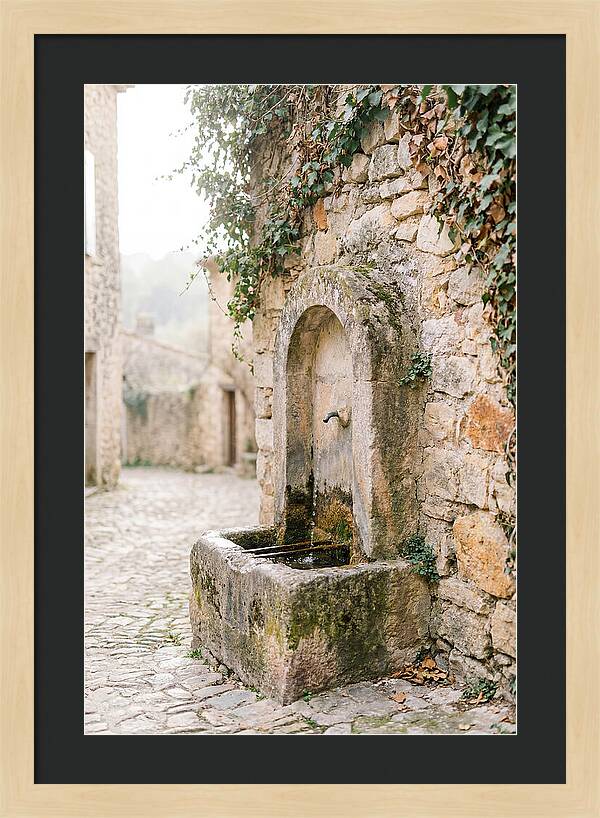 Stone Fountain In Village