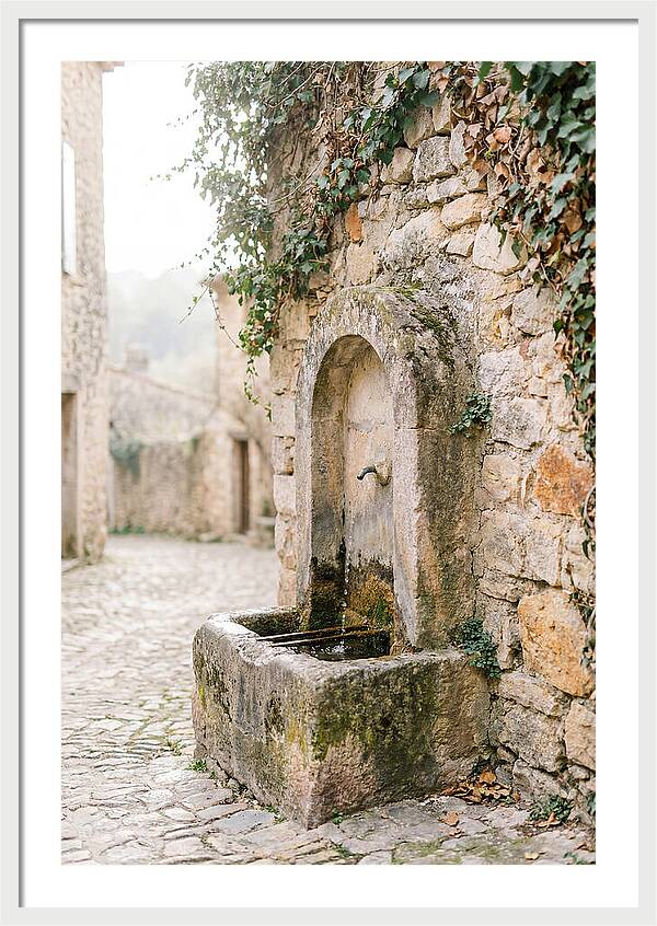 Stone Fountain In Village