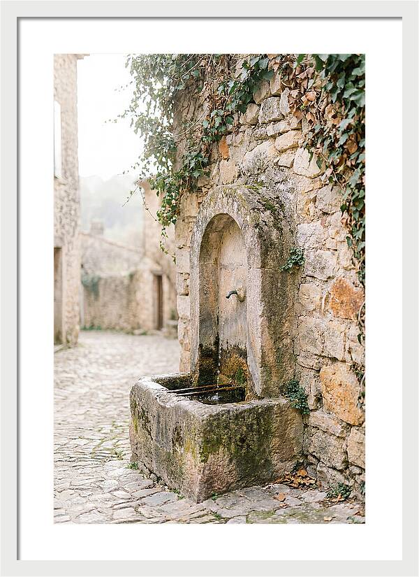 Stone Fountain In Village