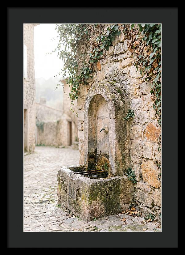 Stone Fountain In Village