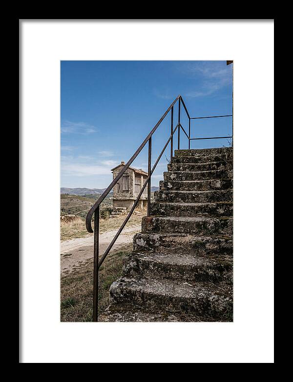 Stone Granary Steps Under Blue Sky
