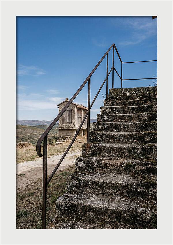 Stone Granary Steps Under Blue Sky