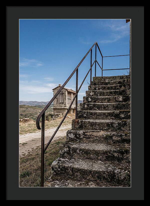 Stone Granary Steps Under Blue Sky