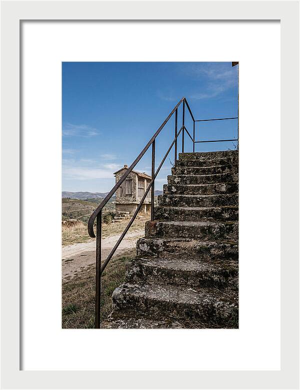 Stone Granary Steps Under Blue Sky