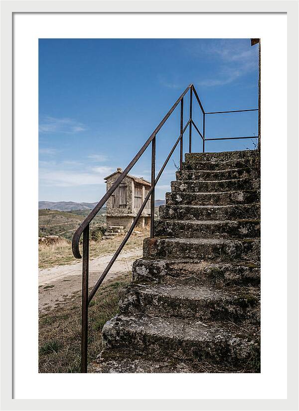 Stone Granary Steps Under Blue Sky