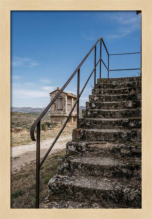 Stone Granary Steps Under Blue Sky