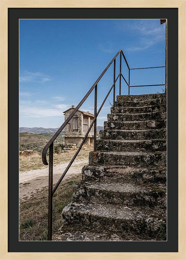 Stone Granary Steps Under Blue Sky