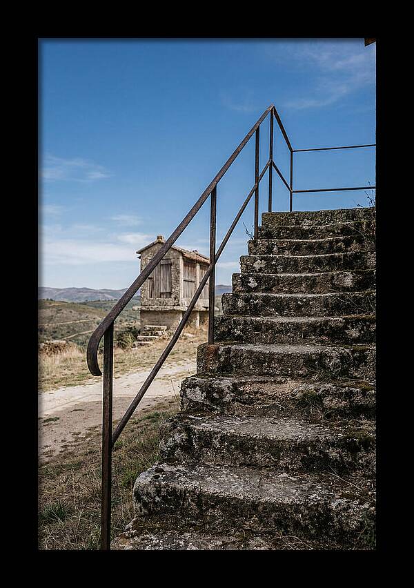 Stone Granary Steps Under Blue Sky