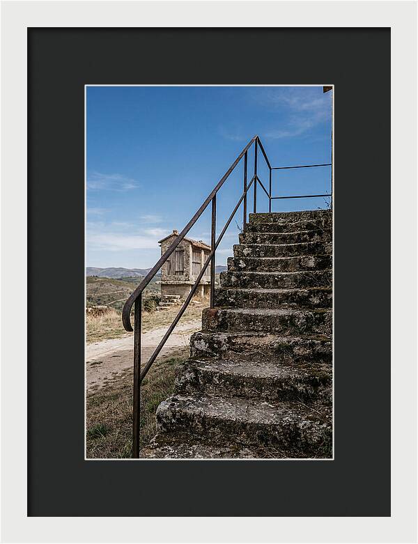 Stone Granary Steps Under Blue Sky