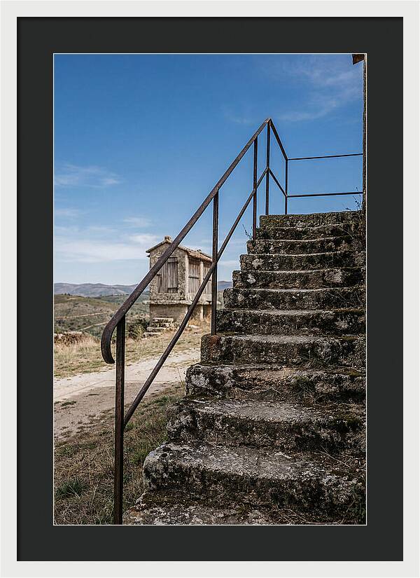 Stone Granary Steps Under Blue Sky