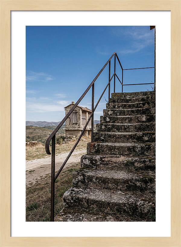 Stone Granary Steps Under Blue Sky