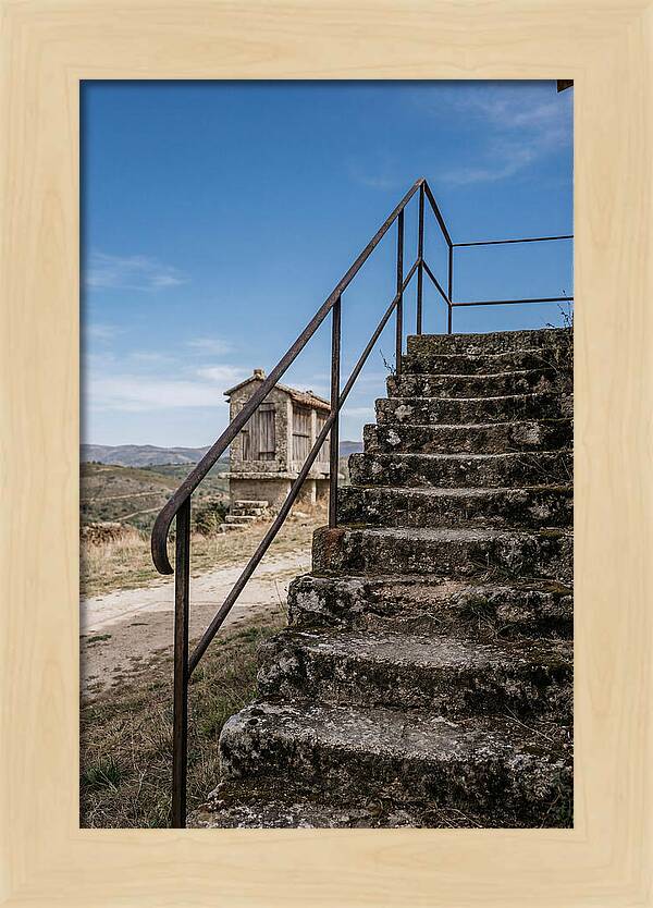 Stone Granary Steps Under Blue Sky